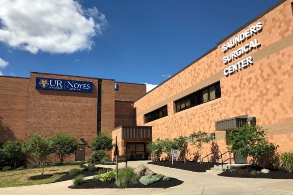 Entrance of the Noyes Hospital, part of University of Rochester, showcasing modern architecture and welcoming atmosphere.